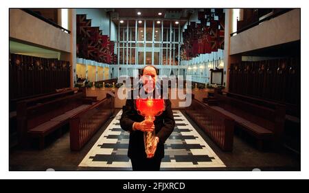 The Reverend Leslie H Bryan CF Senior Chaplain The Household Division with the Beacon Millennium Flame. The flame was Brought from Sunderland  and kept in the Guards Chapel at Wellington Barracks untill the afternoon of the 31st. December. pic Stock Photo