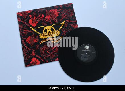 Classic rock band, Aerosmith, music album on vinyl record LP disc. Titled Permanent Vacation Stock Photo