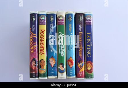 Old vintage Disney VHS movie video tapes, classic children's movies. Aladdin, Pocahontas, Cinderella, Snow White, The Little Mermaid, Beauty and the b Stock Photo