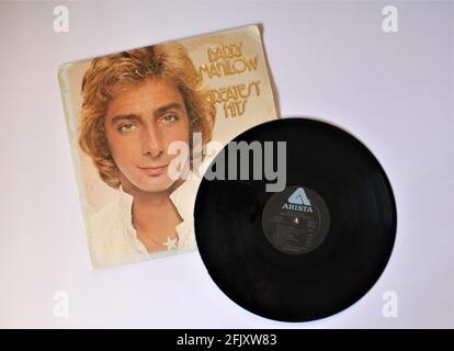 Pop artist, Barry Manilow music album on vinyl record LP disc. The record is titled  Greatest Hits Stock Photo