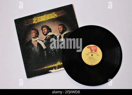 Disco and soul artists, the Bee Gees music album on vinyl record LP disc. Titled: Children of the World Stock Photo