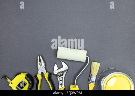 set of different renovation instruments and working tools on grey background. top view, copy space. Stock Photo