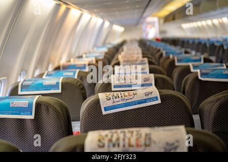 Selective focus of a fabric seat in an empty Spicejet aircraft cabin. Stock Photo