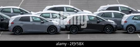 Zwickau, Germany. 23rd Apr, 2021. New cars of the new electric ID.3 from Volkswagen park in a factory parking lot at the Volkswagen plant in Zwickau. VW has completely converted production at its site in Saxony to e-mobility. Credit: Hendrik Schmidt/dpa-Zentralbild/ZB/dpa/Alamy Live News Stock Photo