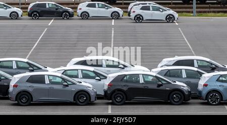 Zwickau, Germany. 23rd Apr, 2021. New cars of the new electric ID.3 from Volkswagen park in a factory parking lot at the Volkswagen plant in Zwickau. VW has completely converted production at its site in Saxony to e-mobility. Credit: Hendrik Schmidt/dpa-Zentralbild/ZB/dpa/Alamy Live News Stock Photo