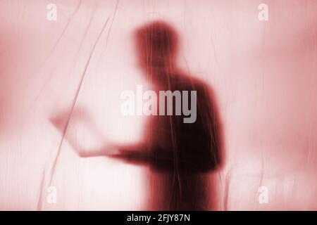 Anonymous Hacker commits cyber crime Stock Photo