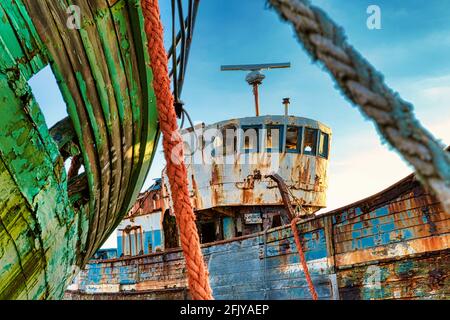 Ship cemetry in Camaret-sur-Mer / France / Brittany - Ship wrecks in the port Stock Photo