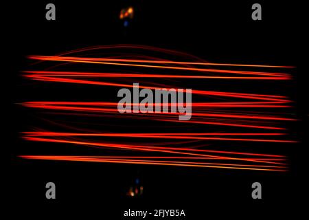incandescent light bulb with a wire filament, The filament is enclosed in a glass bulb with a vacuum or inert gas to protect the filament from oxidati Stock Photo