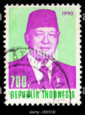 MOSCOW, RUSSIA - SEPTEMBER 27, 2019: Postage stamp printed in Indonesia shows President Suharto, 700 Rp - Indonesian rupiah, serie, circa 1990 Stock Photo