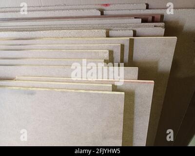 A stack of plywood sheets for construction. Stock Photo