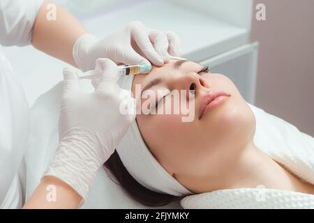 beauty injections into beautiful face. smoothing of mimic wrinkles