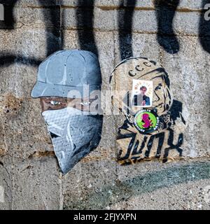 Graffiti,street art and stickers on a wall in Mitte,Berlin,Germant Stock Photo