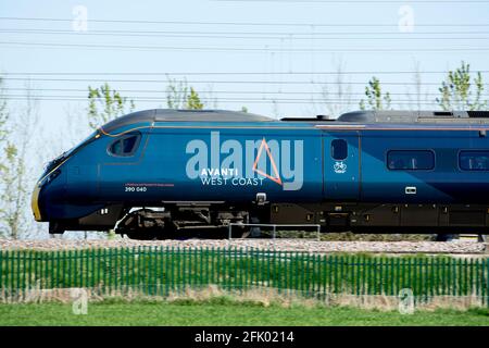 An Avanti West Coast Pendolino electric train, side view, Warwickshire, UK Stock Photo