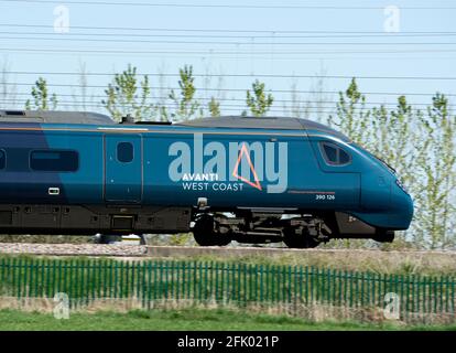 An Avanti West Coast Pendolino electric train, side view, Warwickshire, UK Stock Photo