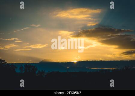 Magical sunrise over Mount Doom a.k.a. as Mount Ngauruhoe in New Zealand near Mount Tongariro Stock Photo