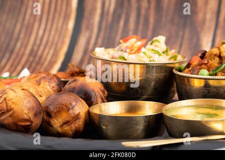 Litti Chokha Or Liti Choka From Bihar Jharkhand And Uttar Pradesh Is Stuffed With Chana Sattu. Served With Alu Or Aloo Baingan Bharta Desi Ghee Lehsun Stock Photo