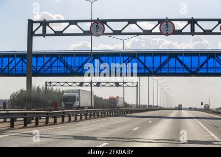 Interstate Highway Ufa - Kazan M7, Russia - Apr 23th 2021. The aquiduct is blue on the main road, the signs indicate - the height of the passage is 5 Stock Photo