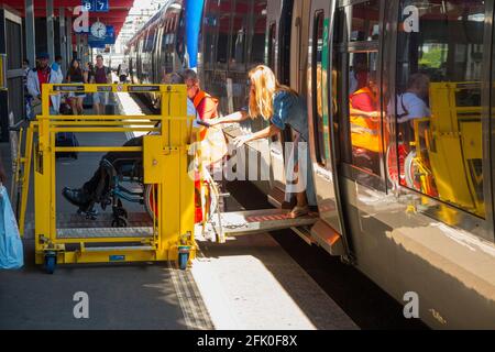 A disabled passenger ramp to a train at Geneva railway station ...