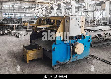 Industrial plant machine equipment for cutting sheet metal in the reinforcing workshop, steel manufacturing. Stock Photo