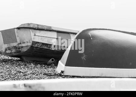 Boats on the shingle Beach at Seaford, East Sussex Stock Photo