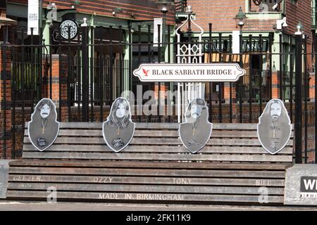 The bridge on Broad Street, Birmingham, renamed the Black Sabbath Bridge after the music rock group Black sabbath who were formed in the City. The bridge has a seat where you can sit alongside members of the band. Stock Photo