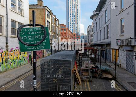 A once vibrant area of Shoreditch looks tatty sad and abandoned during the lock down imposed by the UK government during the Covid 19 Pandemic Stock Photo