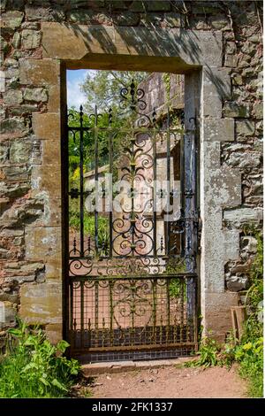 Closed gate at Knightshayes National Trust leads to the walled garden. Stock Photo