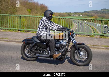 2011 Harley Davidson Xl1200 Forty Eight; Motorbike rider; two wheeled transport, motorcycles, vehicle on British roads, motorbikes, motorcycle bike riders motoring in Manchester, UK Stock Photo