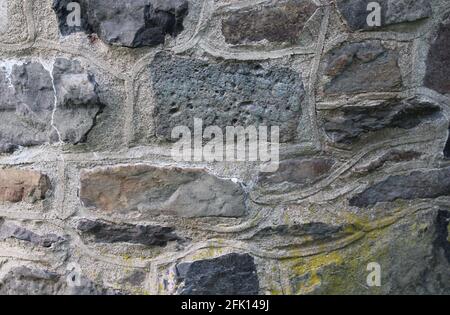 An Old Stone Well Wall Repointed with Cement Stock Photo