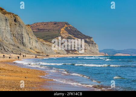 A view of Golden Cap on the Jurassic Coast along Charmouth beach, Dorset, England Stock Photo