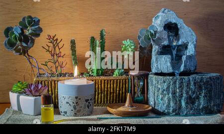 Relaxing home shrine with objects for relaxing and meditation objects used in a meditation spirituality concept Stock Photo