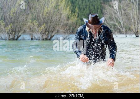 Young man doing a barbecue in the field.Madrid.Spain Stock Photo