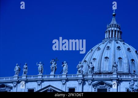 Statues on Bernini's colonnade, and dome of St. Peter's Basilica,Vatican, Rome, Italy. Stock Photo