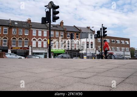 Kingston-Upon Thames London, April 27 2021, Single Cyclist Waiting At Red Traffic Lights