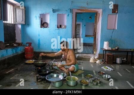 Varanasi, India - April 2021: A man preparing food in Varanasi on April 5, 2021 in Uttar Pradesh, India. Stock Photo