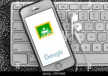 Spain. 27th Apr, 2021. In this photo illustration, a Google Classroom app seen displayed on a smartphone with headphones on a laptop keyboard. Credit: SOPA Images Limited/Alamy Live News Stock Photo