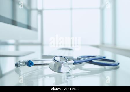 Doctor's desk in clinic with no person. Close up Stock Photo