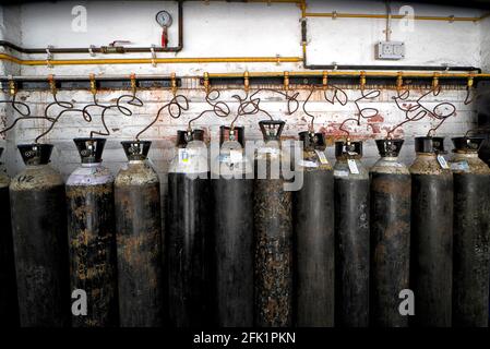 Kolkata, India. 27th Apr, 2021. Oxygen Cylinders getting refilled at a government hospital.Hospitals in India are running out of oxygen supply for the Covid-19 patients during the second wave of Covid-19 pandemic. Credit: SOPA Images Limited/Alamy Live News Stock Photo