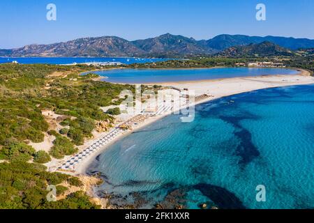 Panoramic view of sandy beach, yachts and sea with azure water, in Villasimius, Sardinia (Sardegna) island, Italy. Holidays, the best beaches in Sardi Stock Photo