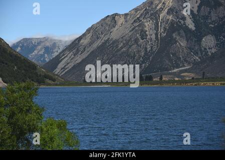 A beautiful panoramic view of mountains and a lake near Arthur's Pass, New Zealand on the South island. Stock Photo