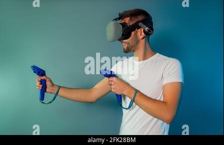 Man using a gaming gadget for virtual reality Stock Photo