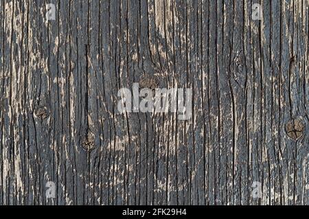 Old wooden background textured surface with peeling black paint. Abstract texture Stock Photo