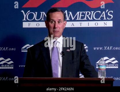 April 27 2021, Reston, Virginia, USA - Former Pennsylvania senator RICK SANTORUM, currently employed as a CNN political pundit, is being assailed for his speech to the right wing student group, Young America's Foundation. Santorum claimed that the United States was built on ''a blank slate. We birthed a nation from nothing. I mean, there was nothing here. I mean, yes, we have Native Americans, but candidly there isn't much Native American culture in American culture.'' FILE PHOTO: April 23, 2021, Reston, Virginia, USA - RICK SANTORUM speaks to the Young America's Foundation's ''Standi Stock Photo