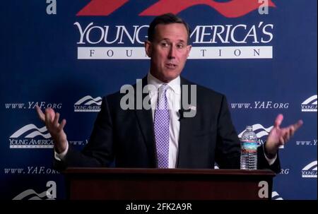 April 27 2021, Reston, Virginia, USA - Former Pennsylvania senator RICK SANTORUM, currently employed as a CNN political pundit, is being assailed for his speech to the right wing student group, Young America's Foundation. Santorum claimed that the United States was built on ''a blank slate. We birthed a nation from nothing. I mean, there was nothing here. I mean, yes, we have Native Americans, but candidly there isn't much Native American culture in American culture.'' FILE PHOTO: April 23, 2021, Reston, Virginia, USA - RICK SANTORUM speaks to the Young America's Foundation's ''Standi Stock Photo