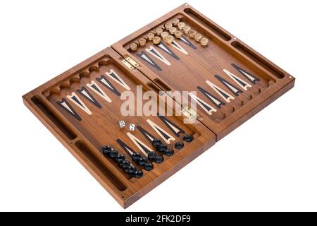 Board backgammon made of wood. dices chips and opened box of natural bog oak or larch. collectible gift gambling game isolated on white background Stock Photo