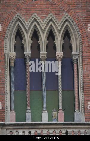 gothic windows on the facade of the church Stock Photo