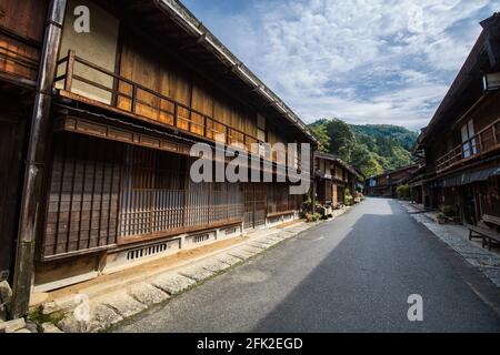 Old Japanese post town of Tsumago. Japanese tourist landmark village. Historic restored village on the Nakasendo trail in the Kiso Valley, Japan. Stock Photo