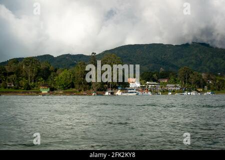 Guatapé, Antioquia, Colombia - April 3 2021: Various Small Leisure Boats on the lake at Guatape Marina at Dusk Marina at Dusk Stock Photo