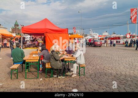 HELSINKI, FINLAND - AUGUST 25, 2016: View of food stalls at Kauppatori Market Square in Helsinki Stock Photo