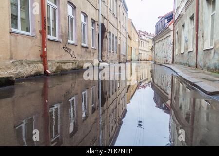 KAUNAS, LITHUANIA - AUGUST 16, 2016: Street flooded after rain in the center of Kaunas, Lithuania. Stock Photo